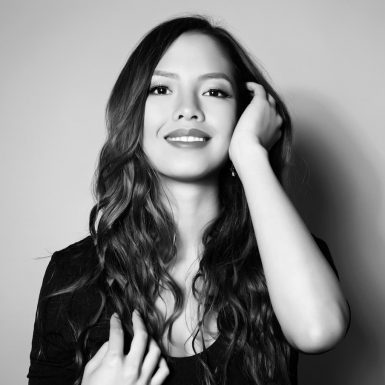 woman touching her hair