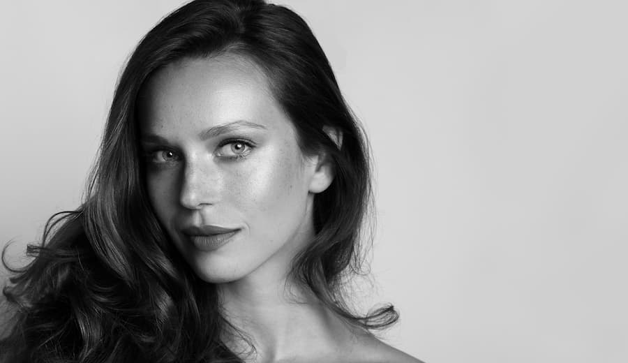 greyscale photo of woman's face