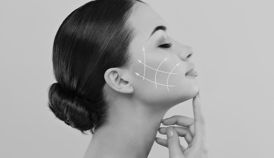 profile view of woman's face with arrows on it